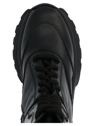 Shop Miu Miu Zipped Chunky Sole Ankle Boots In Black