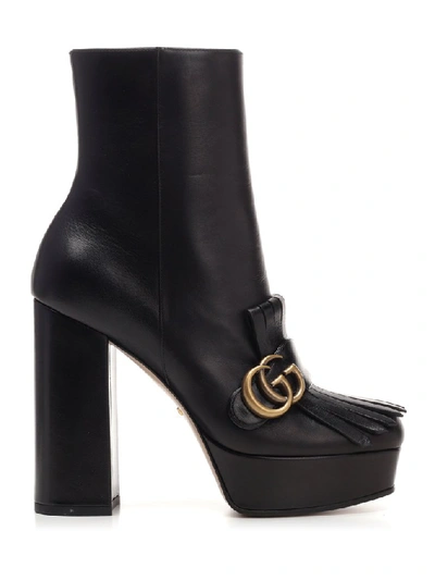 Shop Gucci Gg Marmont Heeled Ankle Boot In Black