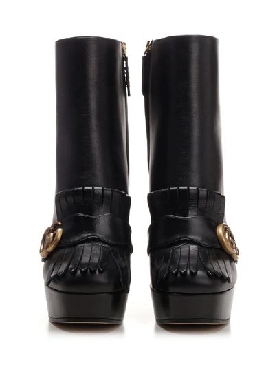 Shop Gucci Gg Marmont Heeled Ankle Boot In Black
