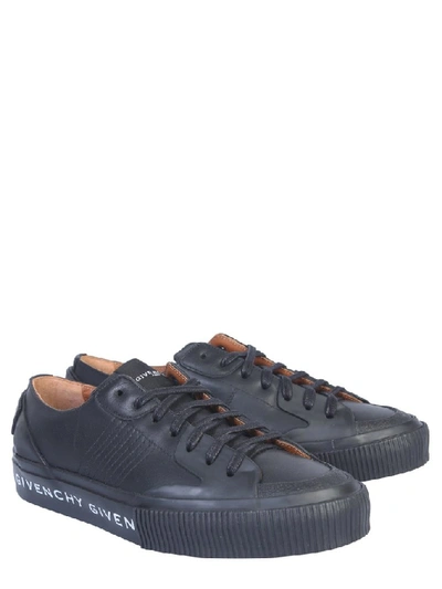 Shop Givenchy Logo Print Lace Up Sneakers In Black