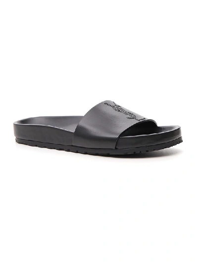 Shop Saint Laurent Monogram Pool Slides In Black