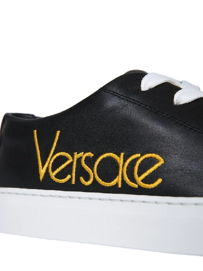 Shop Versace Embroidered Logo Sneakers In Multi