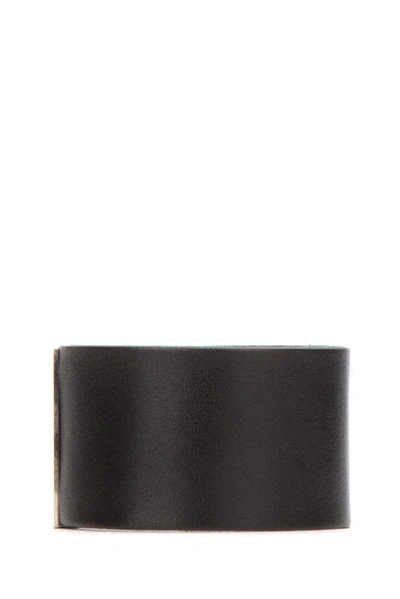 Shop Saint Laurent Logo Cuff Bracelet In Black