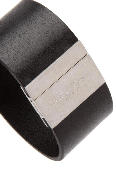 Shop Saint Laurent Logo Cuff Bracelet In Black