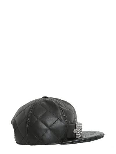 Shop Moschino Logo Quilted Embellished Cap In Black