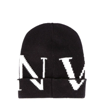 Shop Valentino Vltn Ribbed Beanie In Black