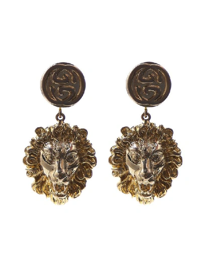 Shop Gucci Lion Motif Drop Earrings In Gold