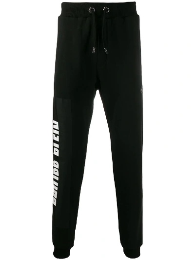 Shop Philipp Plein Tapered Logo Jogging Trousers In Black