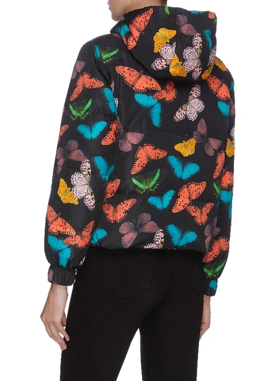 Shop Alice And Olivia 'durham' Butterfly Print Reversible Hooded Puffer Jacket In Multi-colour