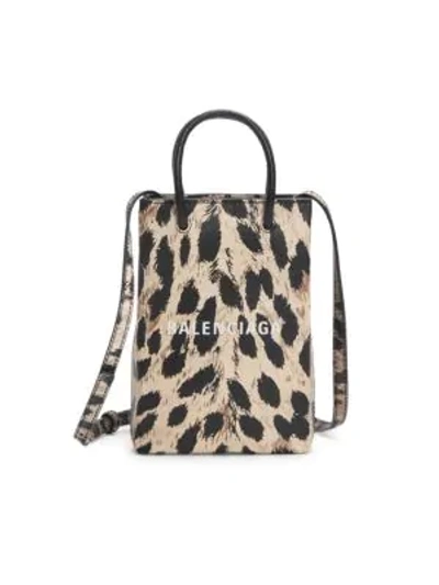 Shop Balenciaga Leopard-print Leather Phone Case In Brown