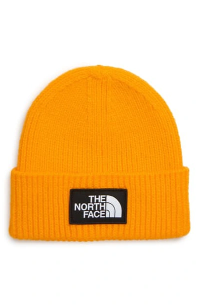 Shop The North Face Logo Cuffed Beanie In Yellow