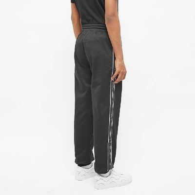 Shop Givenchy Taped Logo Track Pant In Black