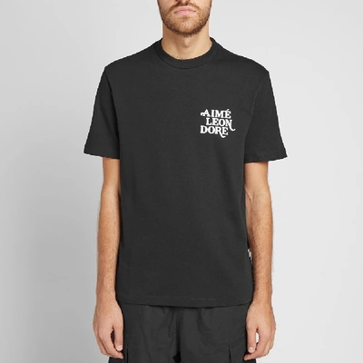 Shop Aimé Leon Dore 70s Logo Graphic Tee In Black