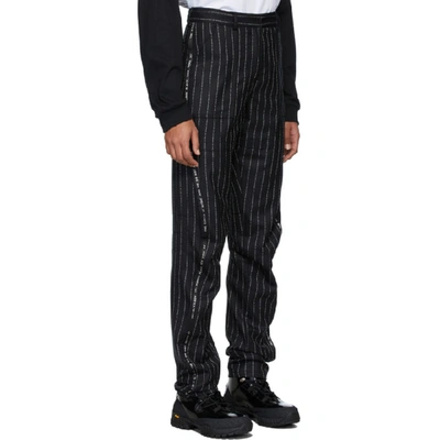 Shop Alyx 1017  9sm Black Pinstripe Tracksuit Trousers In 001 Black