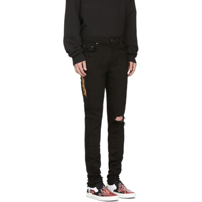 Shop Amiri Black Leopard Half Track Broken Jeans In Bll