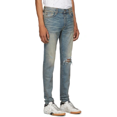 Shop Amiri Indigo Broken Jeans In Inc