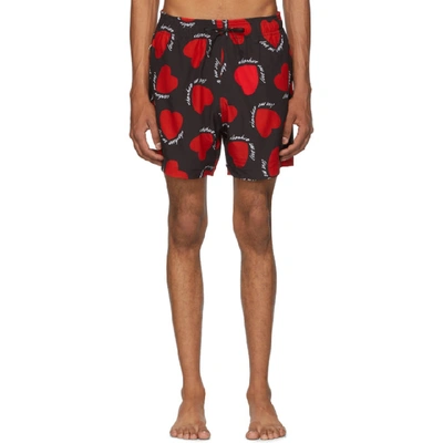 Shop Amiri Black And Red Hearts Swim Shorts In Blk