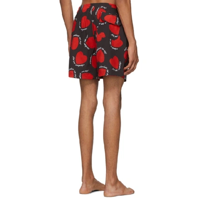 Shop Amiri Black And Red Hearts Swim Shorts In Blk