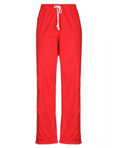 Shop Champion Pants In Red
