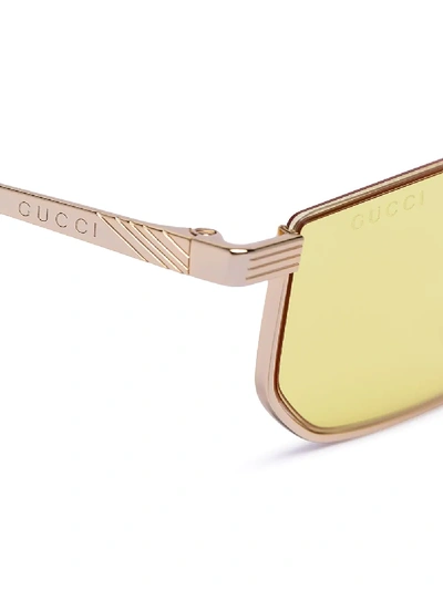 Shop Gucci Yellow Slim Rectangle Sunglasses In Gold