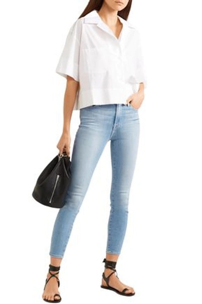 Shop Frame Cropped Faded High-rise Skinny Jeans In Light Denim