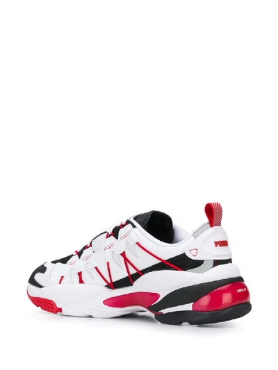 Shop Puma Lqd Cell Omega Sneakers In White