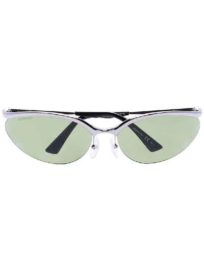 Shop Balenciaga Wrap-around Tinted Sunglasses In Silver