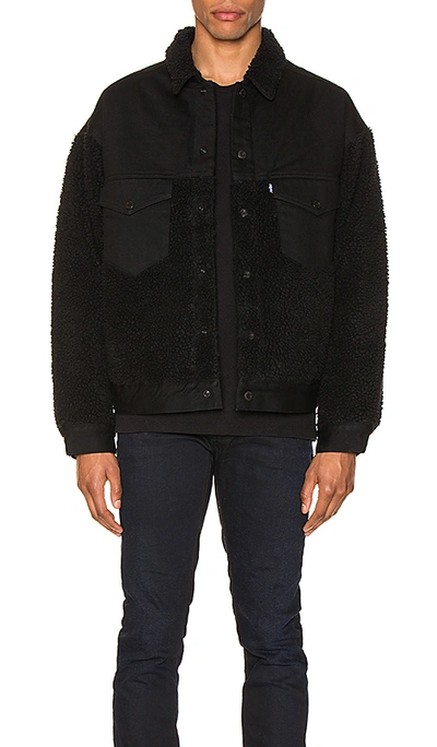 Shop Levi's Oversized Sherpa Trucker Jacket In Ivan Black