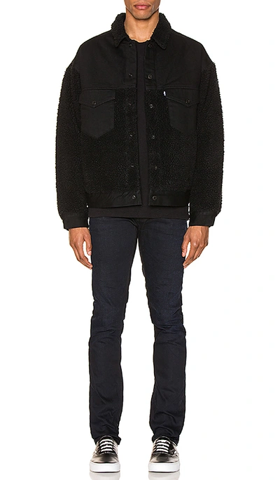 Shop Levi's Oversized Sherpa Trucker Jacket In Ivan Black