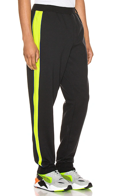 Shop Puma X Ader T7 Trousers In Black