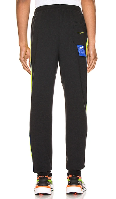 Shop Puma X Ader T7 Trousers In Black