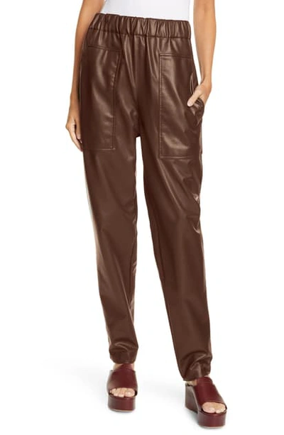 Shop Tibi Faux Leather Jogger Pants In Brown
