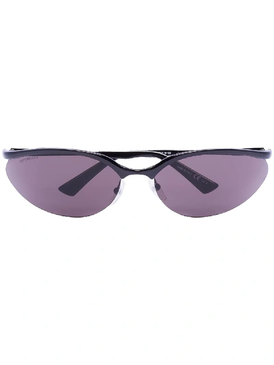Shop Balenciaga Wrap-around Tinted Sunglasses In Black