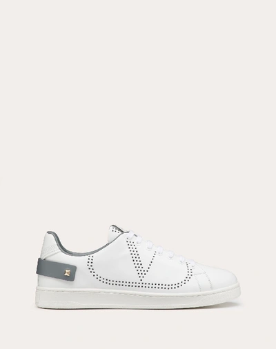 Shop Valentino Garavani Uomo Backnet Calfskin Sneaker In White/stone