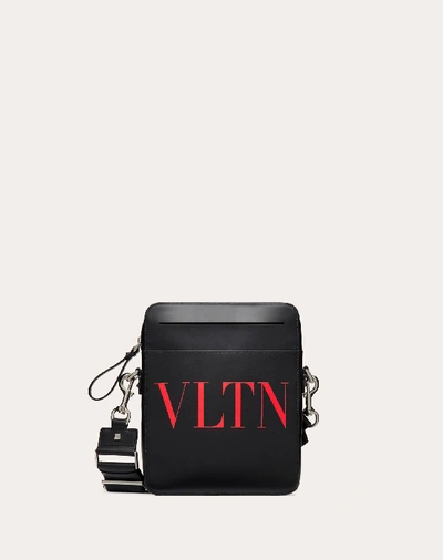Shop Valentino Garavani Uomo Vltn Leather Crossbody Bag In Black/pure Red