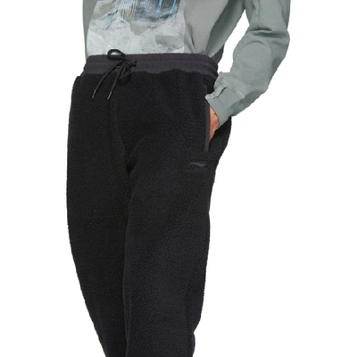 Shop Li-ning Black Fleece Jogger Lounge Pants In Standardblk
