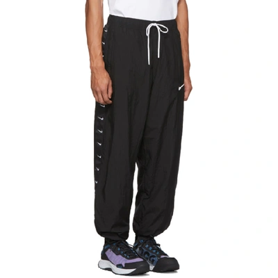 Shop Nike Black Swoosh Lounge Pants In 010blackwhi