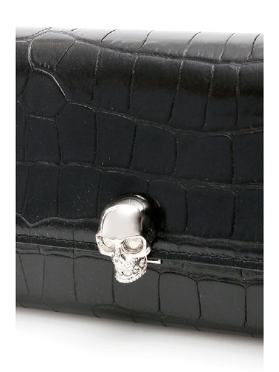 Shop Alexander Mcqueen Skull Buckle Mini Clutch In Black (black)