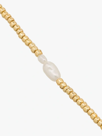 Shop Anni Lu Gold Tone Petite Pearl Bracelet In Metallic
