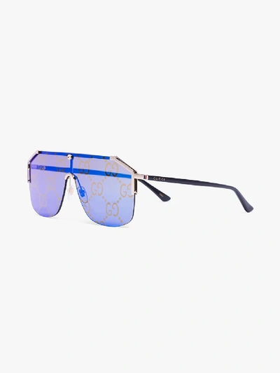 Shop Gucci Eyewear Blue Logo Print Sunglasses In Metallic