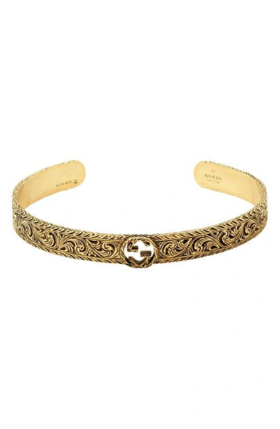 Shop Gucci Interlocking-g Cuff Bracelet In Yellow Gold
