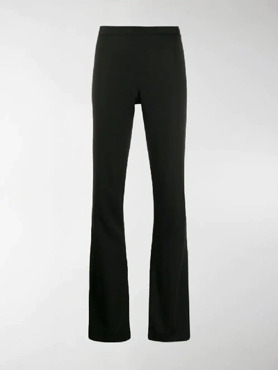 Shop Versace High-waisted Bootcut Trousers In Black