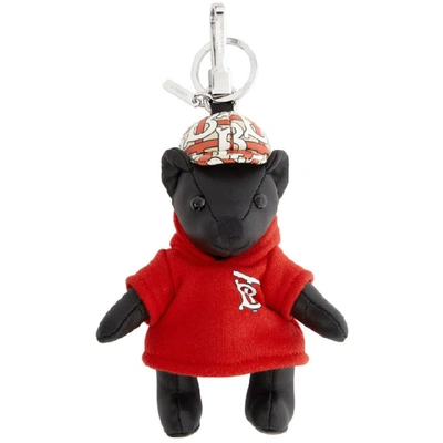 Shop Burberry Black Leather Thomas Hoodie And Cap Keychain In Red