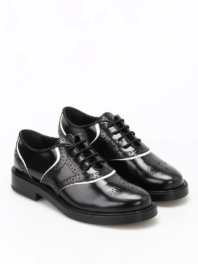 Shop Tod's Brushed Leather Oxford Brogues In Black+yogurt