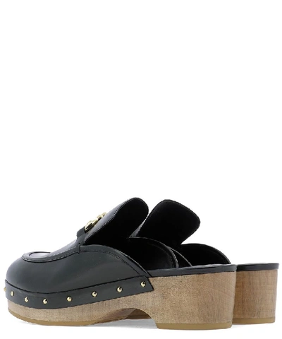 Shop Ferragamo Salvatore  Gancini Stud Embellished Mules In Black