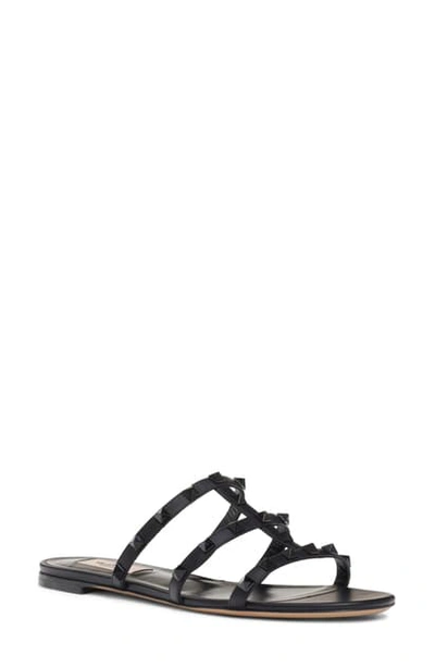 Shop Valentino Rockstud Slide Sandal In Black