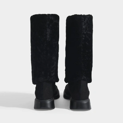 Shop Stuart Weitzman Luiza Chill Turn-up Boots In Black Suede And Shearling