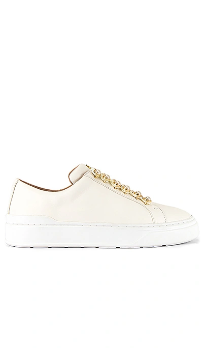 Shop Stuart Weitzman Excelsa Sneaker In Cream