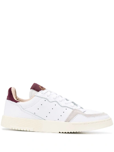 Shop Adidas Originals Supercourt Logo Patch Sneakers In White