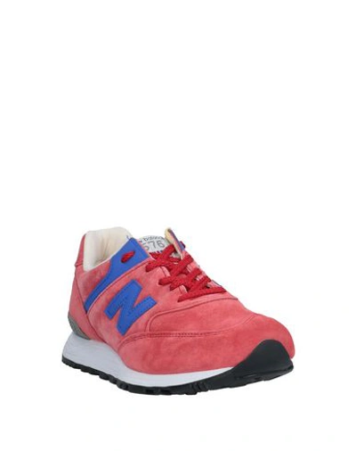 Shop New Balance Sneakers In Red